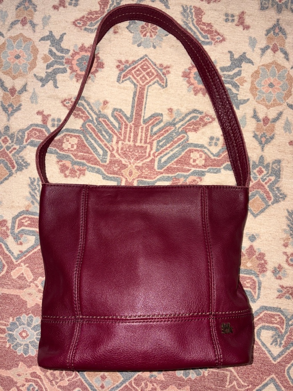 The Sak leather hobo bag/purse in mulberry